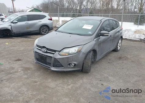 2013 Ford Focus Titanium z USA, uszkodzony, nr VIN 1FADP3N22DL135564